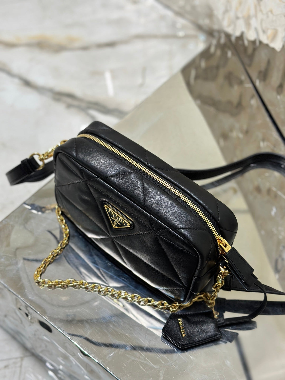 CAMERA BAG 22 IN BLACK TRIANGLE PATTERN QUILTED LAMBSKIN GOLD HARDWARE
