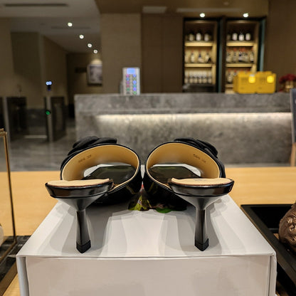 Prada 26s Open Toe Mules 45mm In Black Patent Calfskin With Rosette