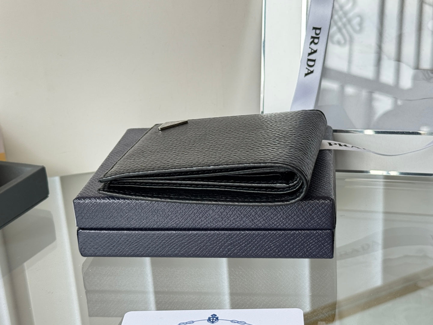 Pra 2M0513  Metal Triangle Logo Wallet 11cm Black lychee-grained cowhide