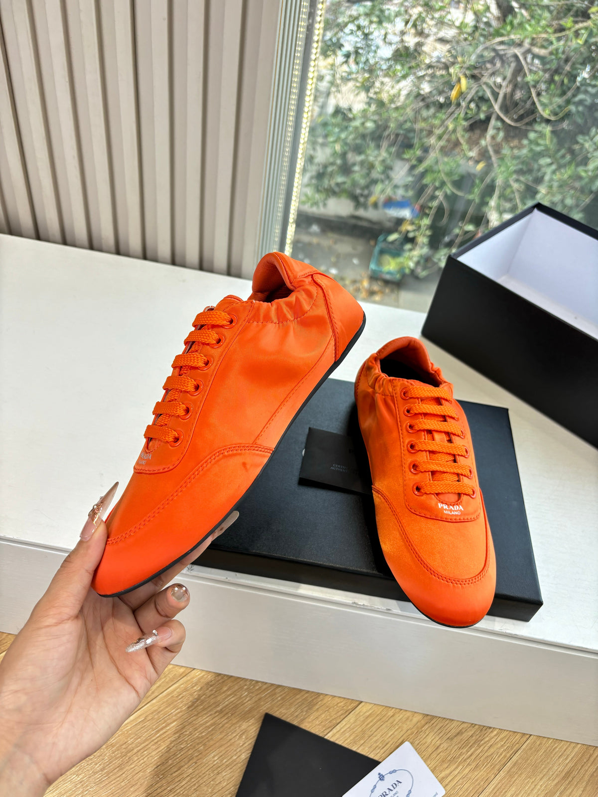 Prada 25s Sneaker In Orange Silk