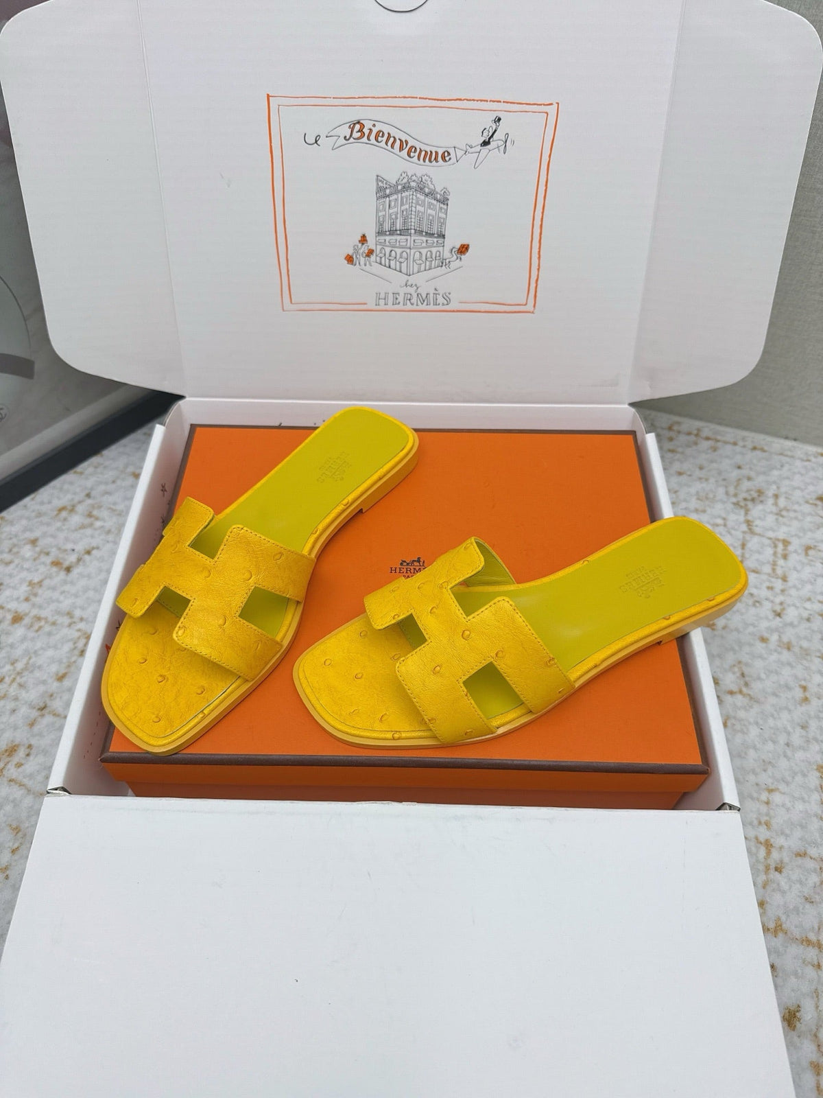 HM 26ss Oran Sandals Yellow Ostrich Leather 625090