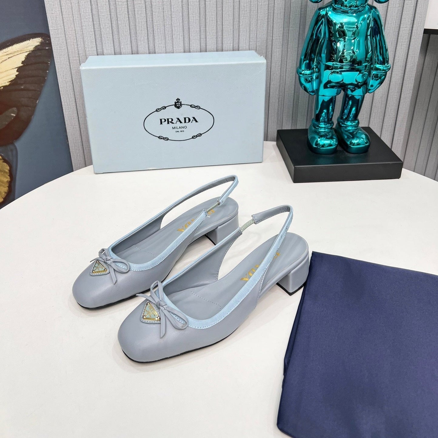 Prada 26s Round Toe Slingback Pumps 40mm In Light Blue Calfskin With Bow