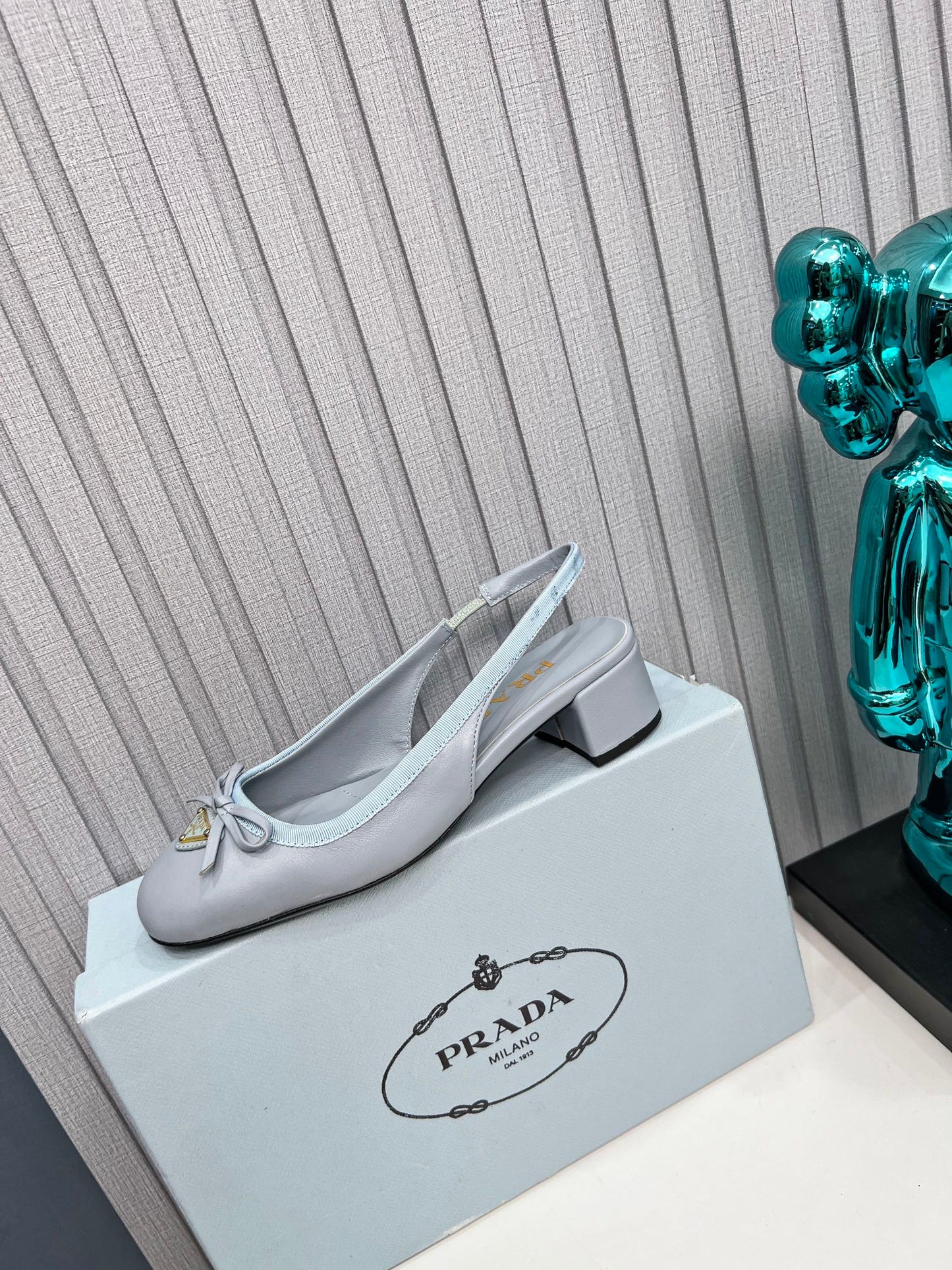 Prada 26s Round Toe Slingback Pumps 40mm In Light Blue Calfskin With Bow