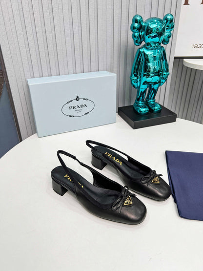 Prada 26s Round Toe Slingback Pumps 40mm In Black Calfskin With Bow