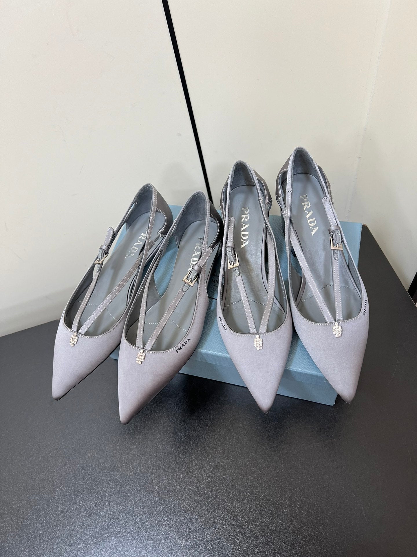 CUT-OUT BALLERINA FLAT IN WARM GRAY SATIN ATTACHED BEAD BUCKLE