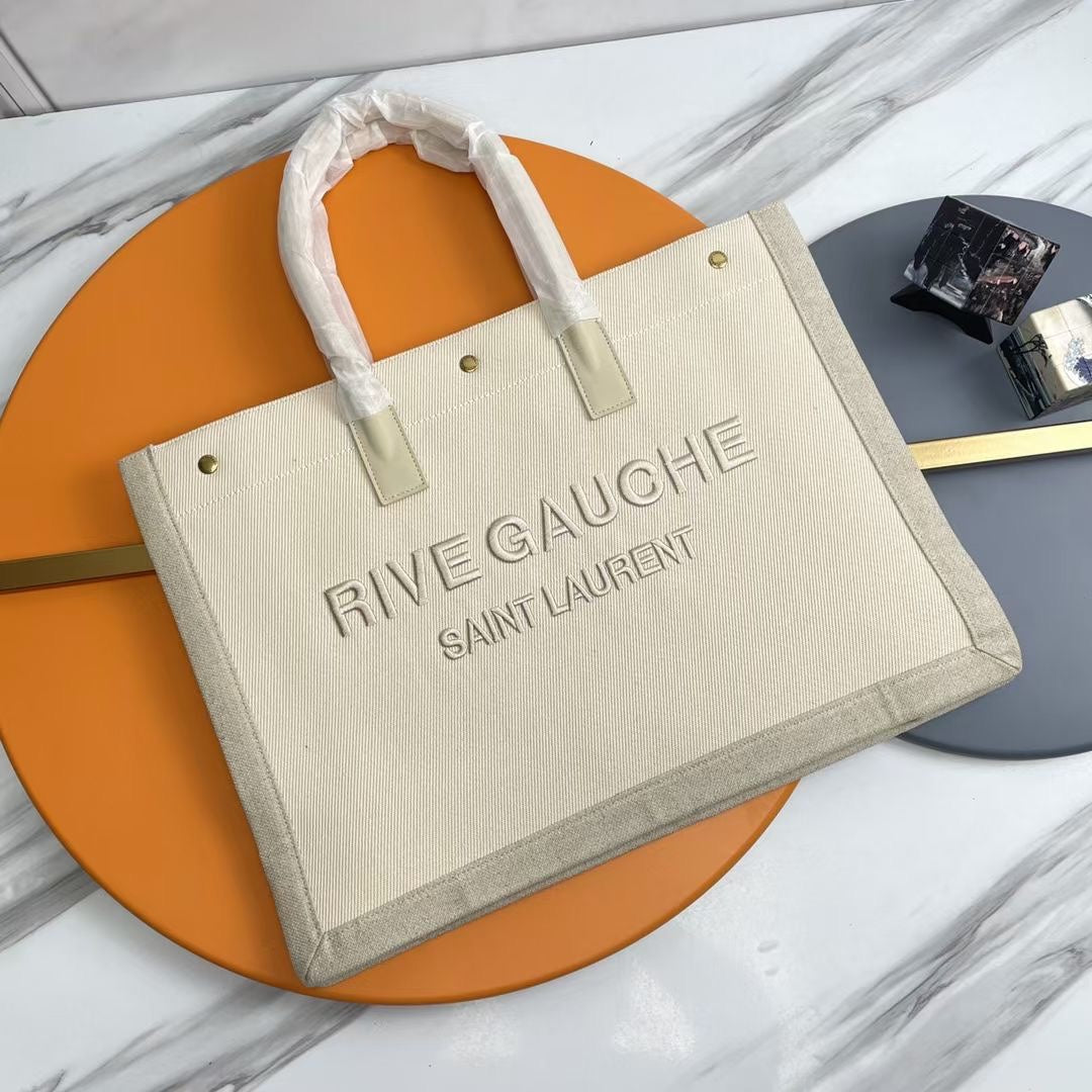 Rive Gauche Tote Ivory Canvas Leather Trim 286036