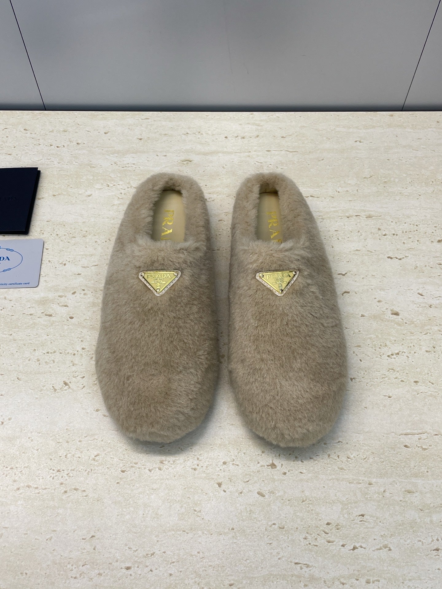 Prada 25s Slide Warm Beige Shearing 551888